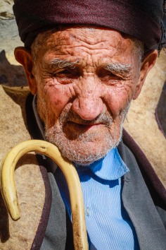 An older Kurdish gentleman in traditional attire